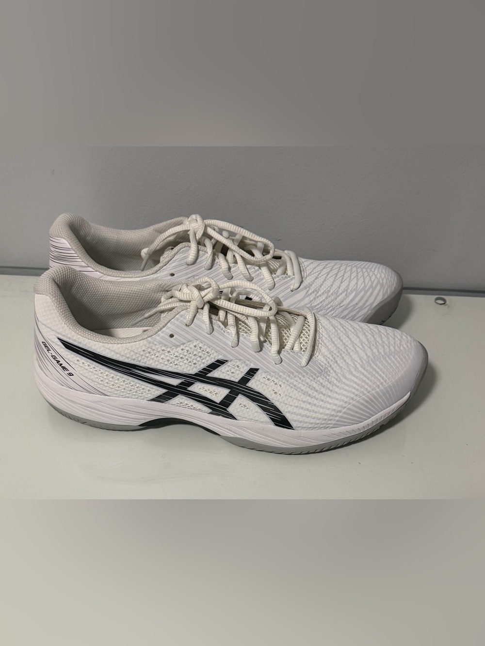 ASICS Gel-Game 9. White Athletic Running Shoes with Black Logo